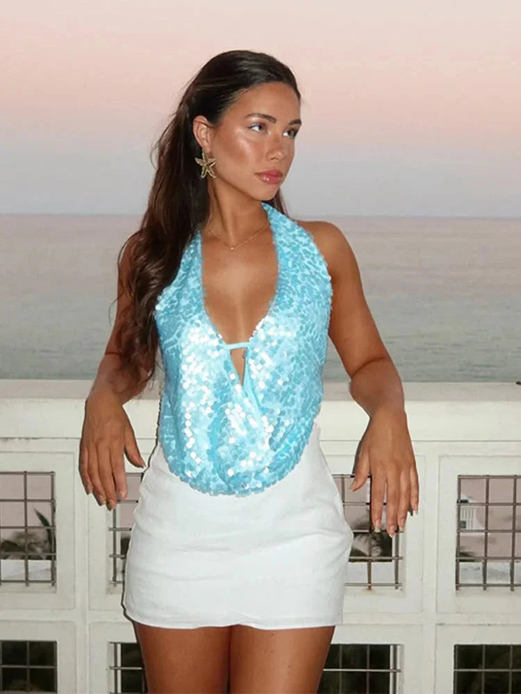 Blue sequined halter neckline tank top for women, shimmering and stylish for casual wear or a night out.