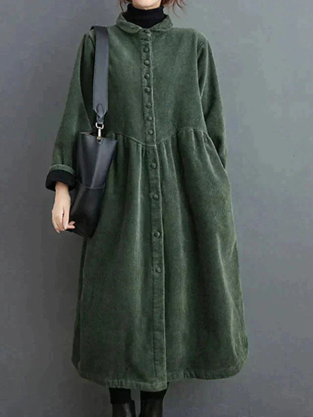 "Darling dress featuring button-front closure, tailored silhouette, and structured warm fabric in a versatile design."