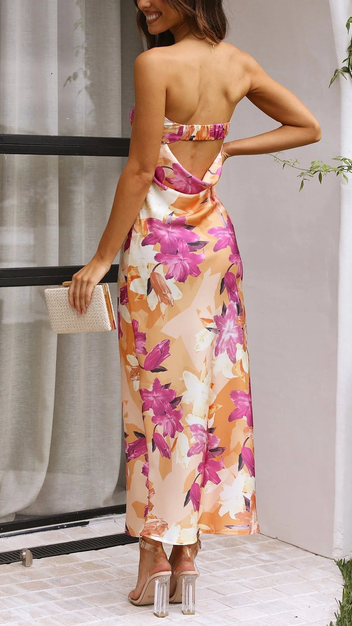 Floral strapless maxi dress for women in soft flowy fabric with vibrant floral print and pleated detailing.