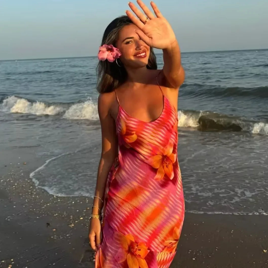 "Alana beach dress in vibrant tropical print, light and breezy for sunny days, perfect for beach outings and casual summer…