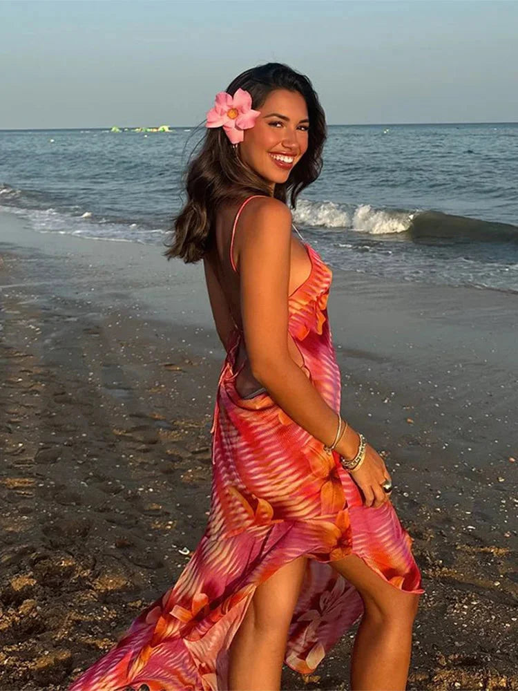 "Alana flowing beach dress in vibrant tropical print, featuring lightweight fabric and a relaxed fit for effortless summer…