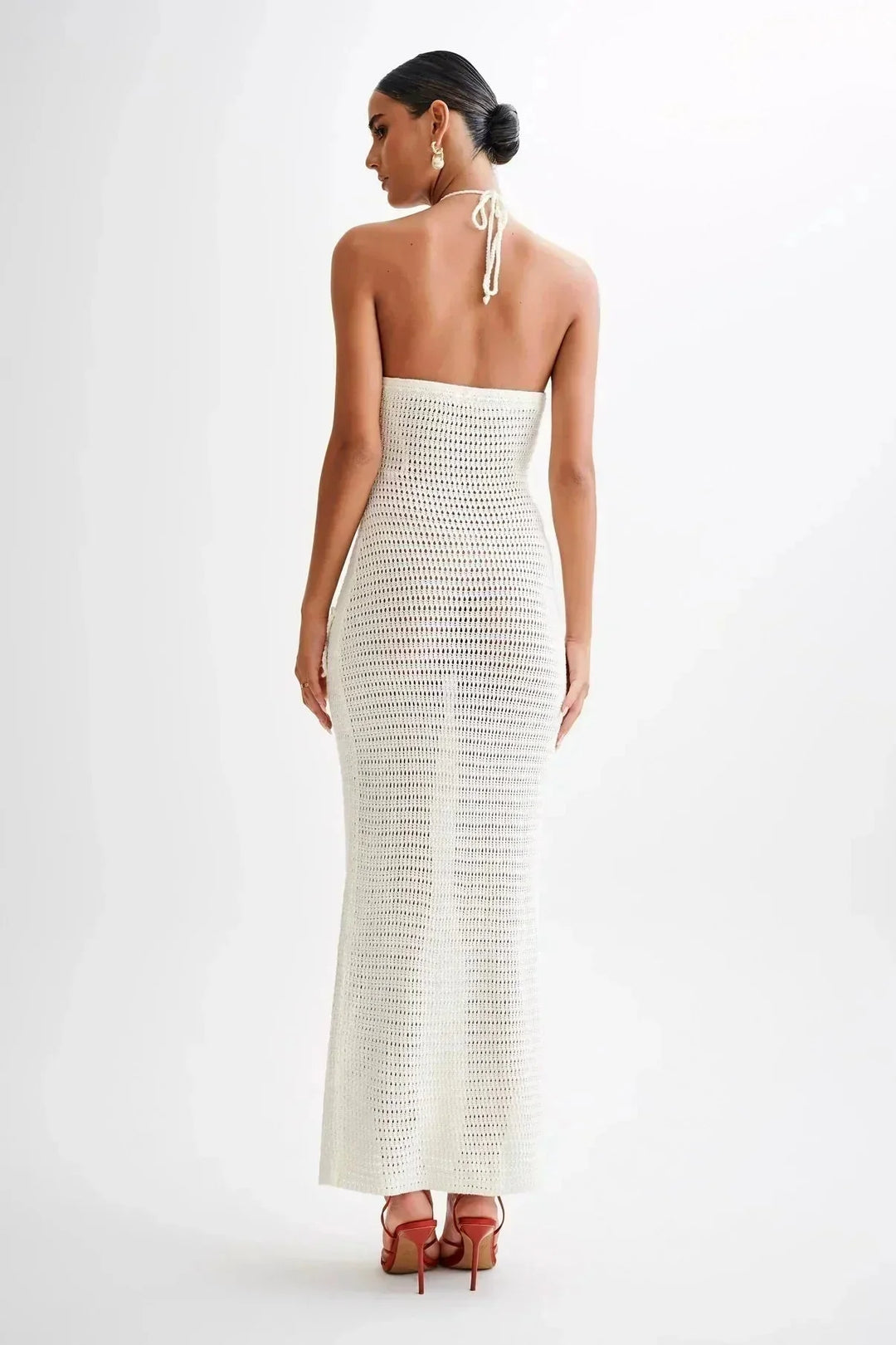 Handmade crochet maxi dress featuring a charming floral design by Annalia, perfect for a stylish and feminine look.