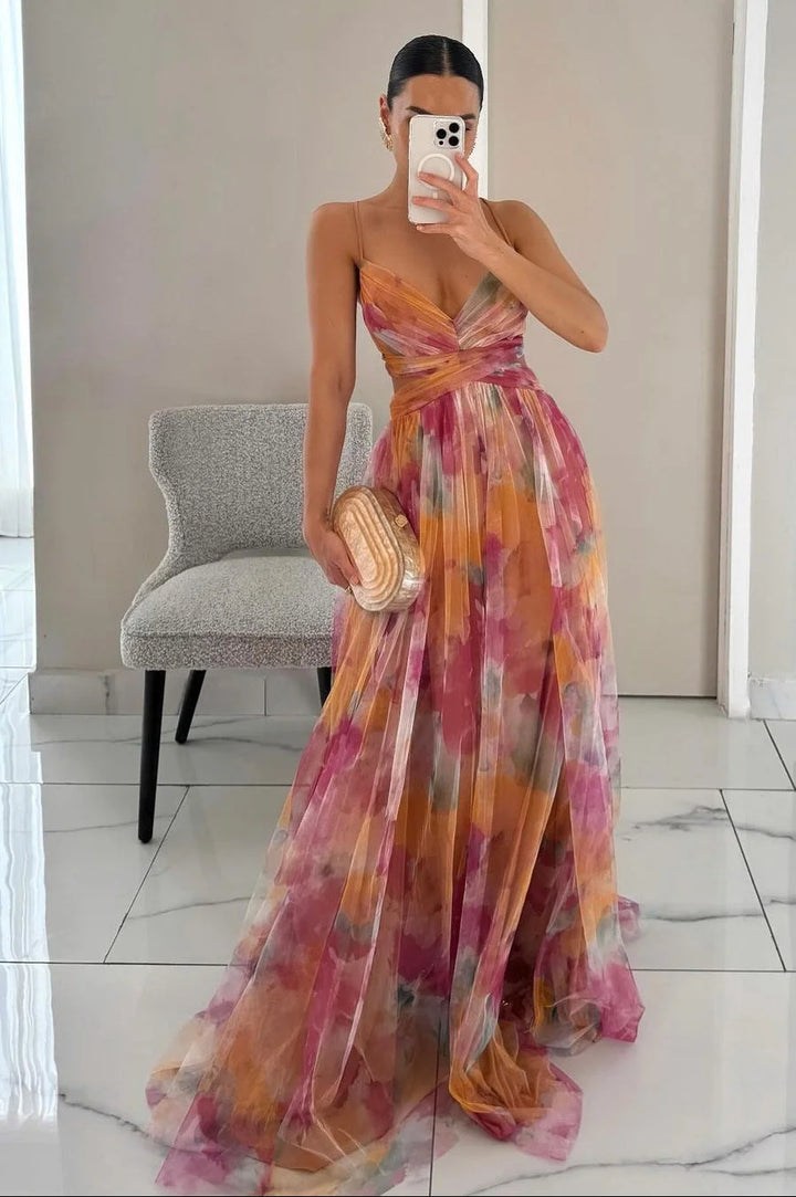 Orange textured maxi dress with tiered layers, adding flowy elegance. Perfect for a chic and stylish look at any event or…