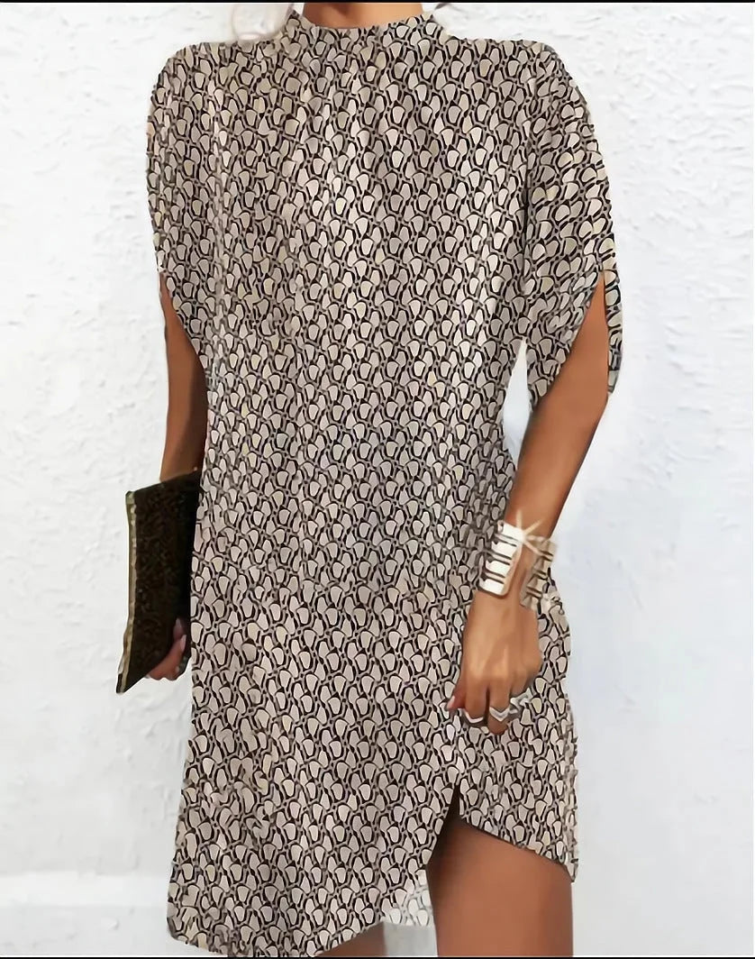 Beige mini dress with batwing sleeves, pleated neckline. Made from soft, flowing fabric, ideal for casual or dressy…