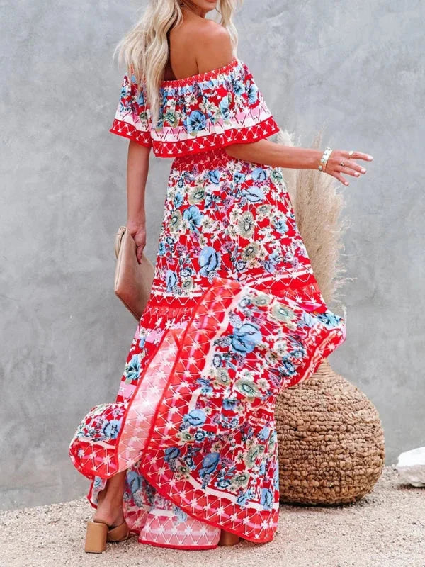 "Amyla maxi dress with floral pattern, tiered design, and belt cinch, made from lightweight fabric perfect for warm weather."