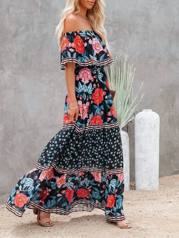 "Amyla maxi dress with belt featuring a floral design on tiered silhouette, made of lightweight and breathable fabric."