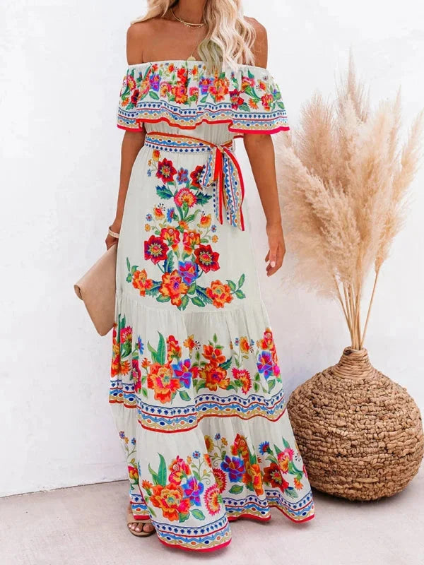 "Amyla - Floral tiered maxi dress with belt in light and flowy fabric, perfect for summer outings"