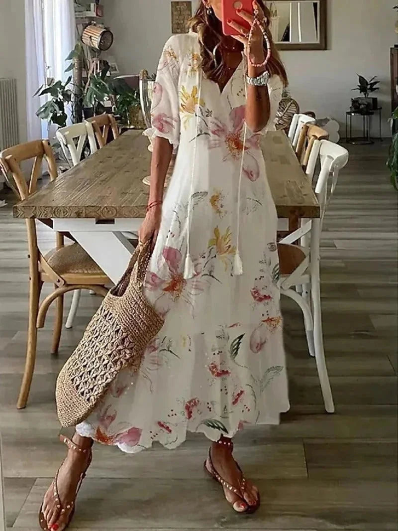 "Isabell - Elbow sleeve floral maxi dress in soft, flowy fabric with Avanna floral print."