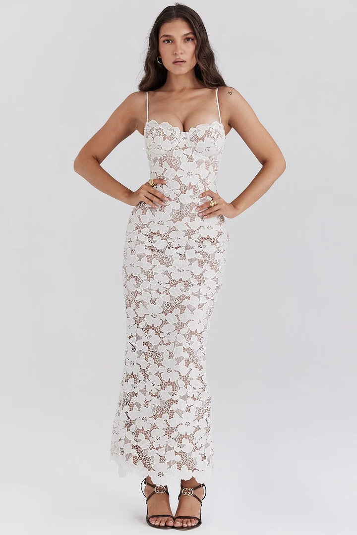 White floral lace spaghetti strap dress with elegant design, perfect for special occasions or summer events.