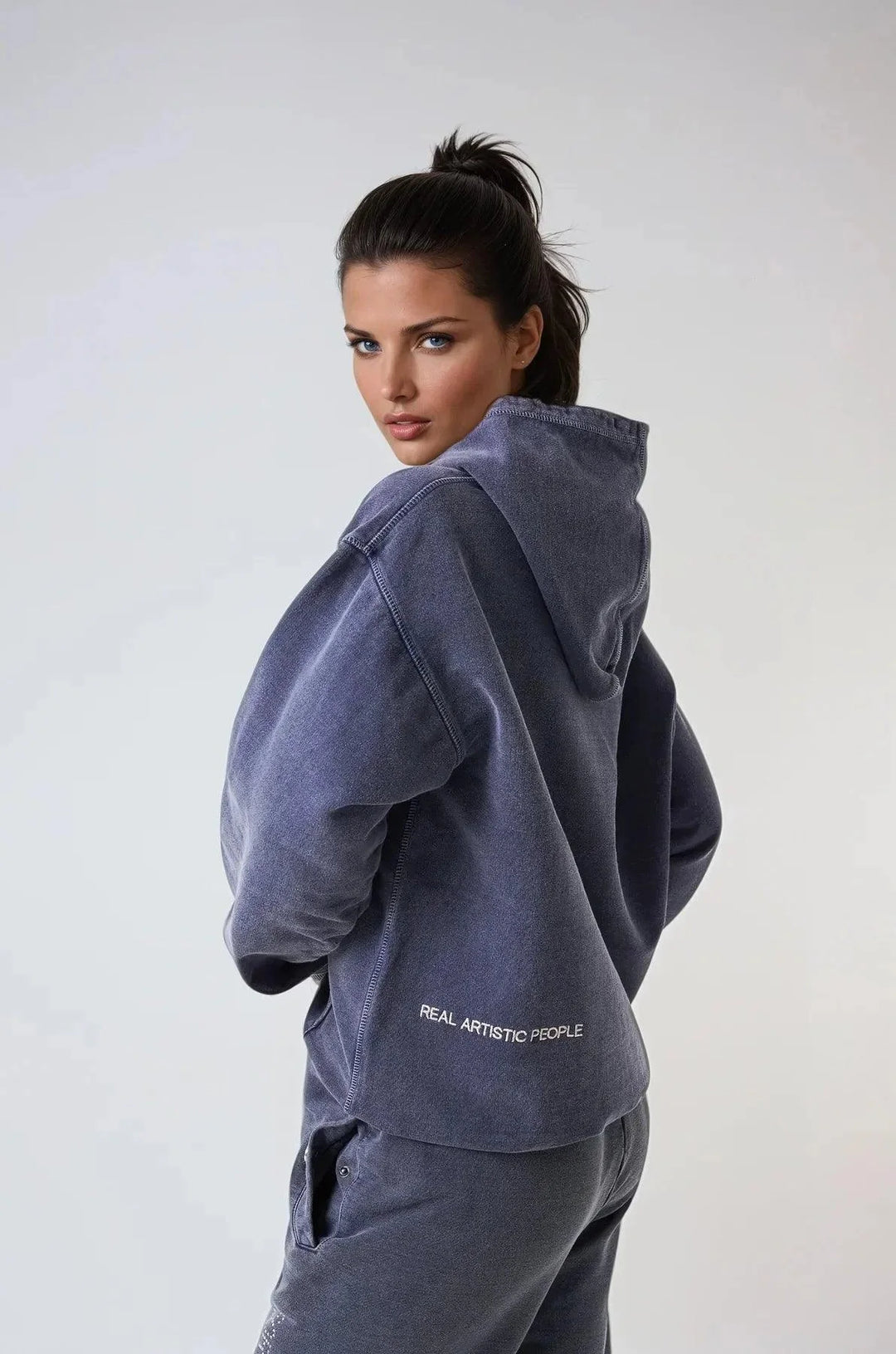 "Navy unisex hoodie featuring bold statement print, made of soft cotton blend fabric."