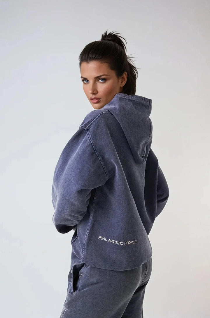 "Navy unisex hoodie featuring bold statement print, made of soft cotton blend fabric."