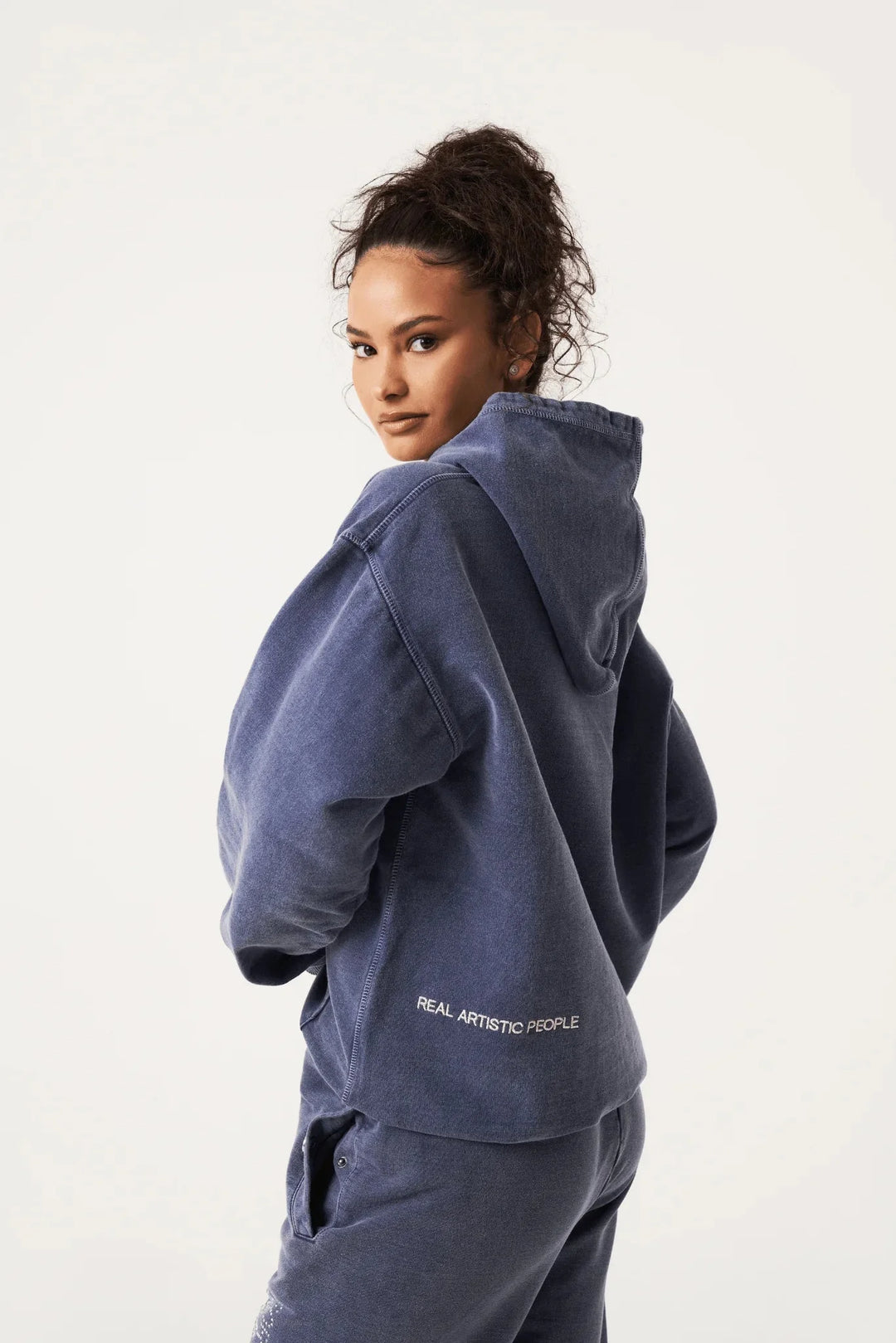 "Navy unisex hoodie featuring a statement print, made with high-quality materials for comfort and style."