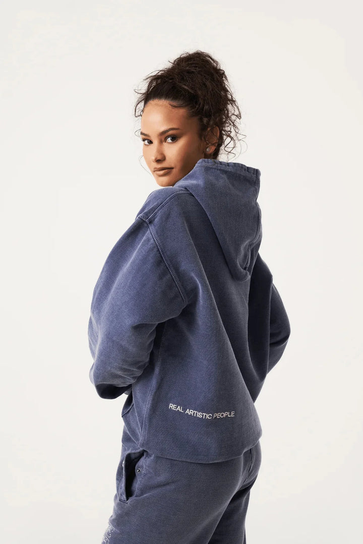 "Navy unisex hoodie featuring a statement print, made with high-quality materials for comfort and style."