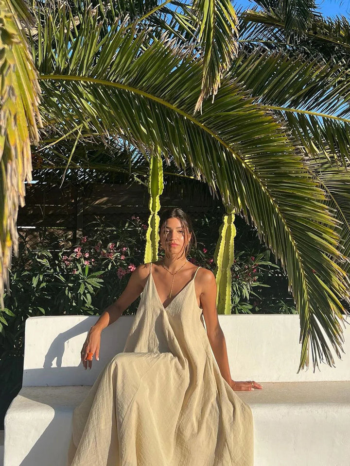 Navy blue Flowy layered maxi dress with V-neck, perfect for casual or formal events, made from soft and lightweight fabric.