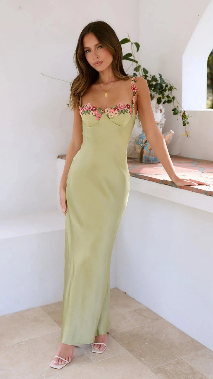 Adelynne maxi dress with embroidered pink florals, featuring soft and breathable fabric with intricate floral detailing.
