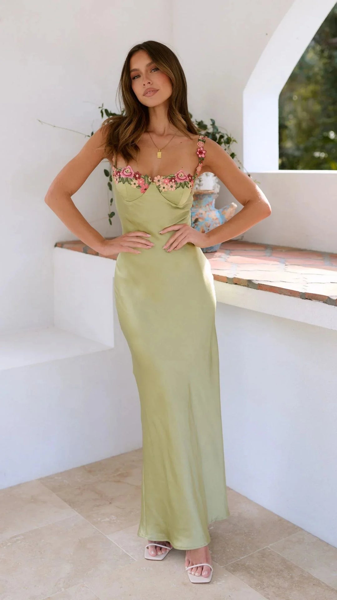 "Adelynne maxi dress featuring delicate embroidered pink florals on a flowy design"