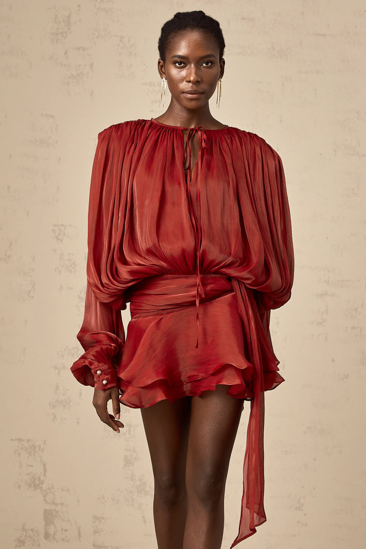 Flowing satin mini dress in Camiyah with tie accents, perfect for a chic and elegant look.