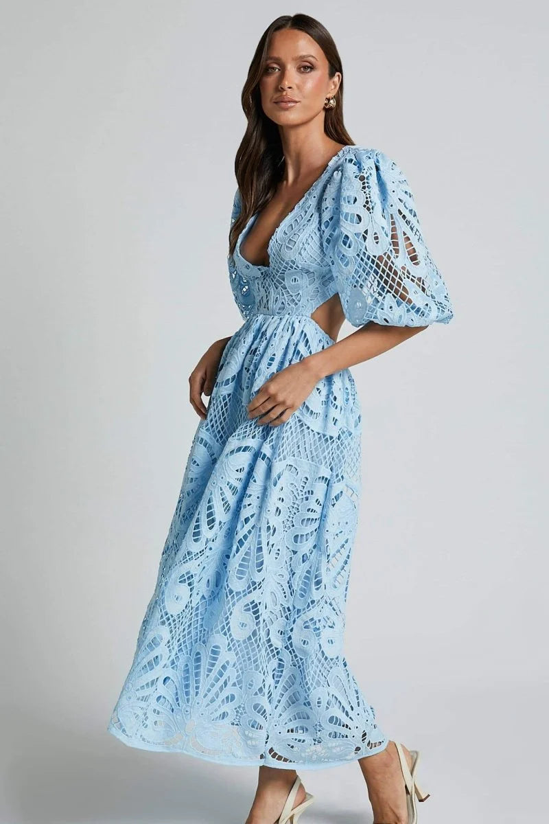 "Roslyn mid-length lace dress in black with V-neckline and intricate floral pattern, perfect for a special occasion or…