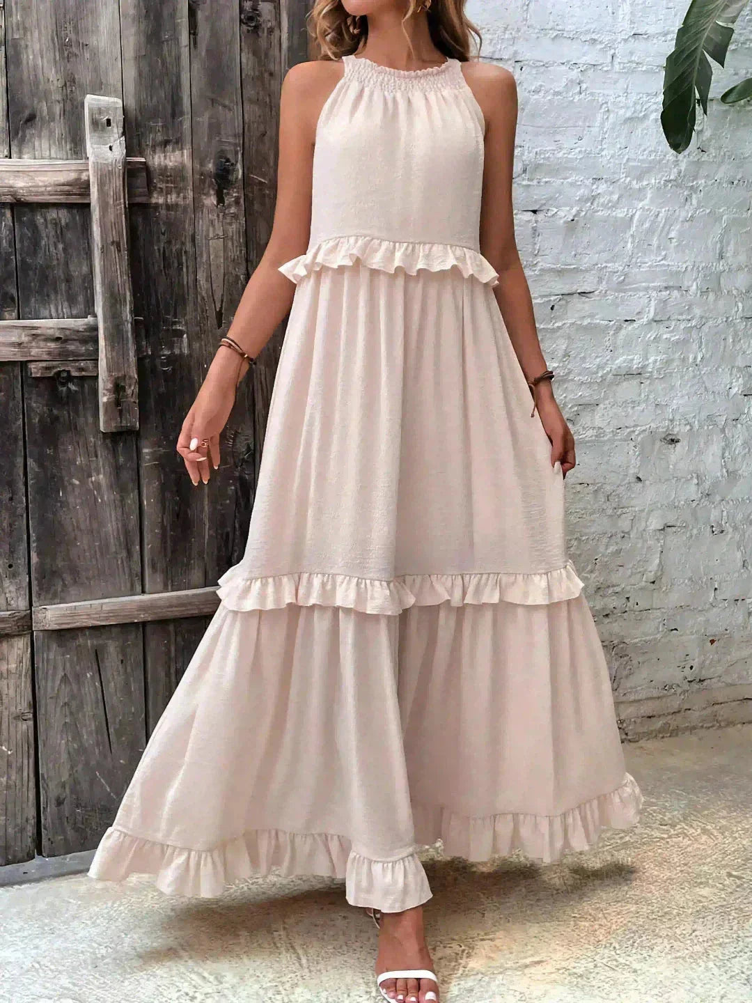 "Wylie Sleeveless Tiered Maxi Dress in a soft, flowing fabric with a tiered design for a boho-chic summer look"