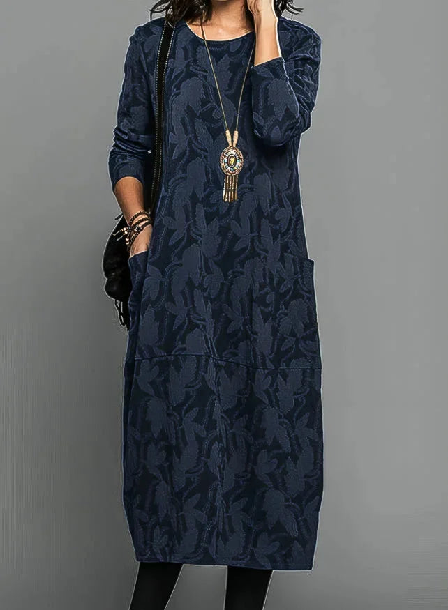 Blue textured jacquard midi dress with pockets, perfect for any occasion. Classic design with a flattering silhouette.