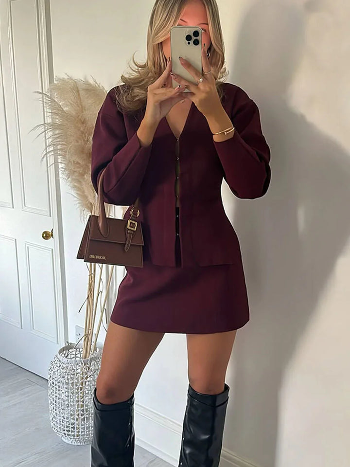 "Wine Red two-piece skirt and jacket set, featuring chic design with modern style, perfect for a classy look on any…