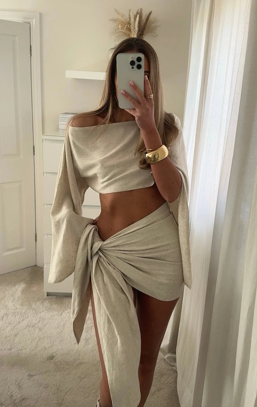 Two-piece linen sarong set by Heba in a chic design, perfect for casual outings or beach days.