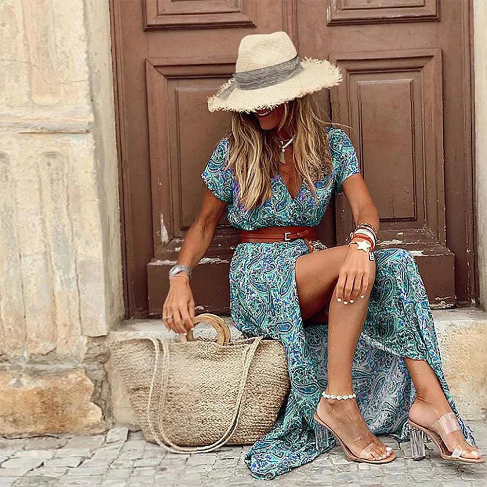Green V-neck maxi dress featuring a delicate floral print and a belt. Perfect for a stylish ensemble with its flowy and…