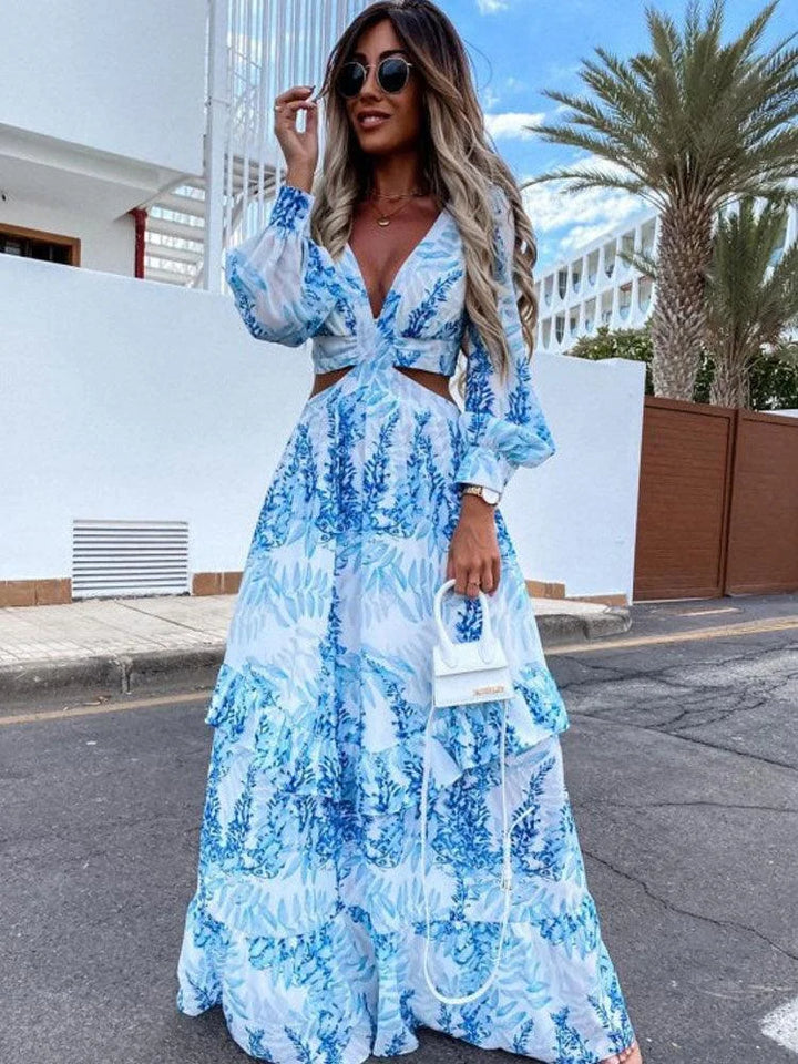 Blue flowy maxi dress with Avanna floral print, perfect for a casual yet stylish look. Made from lightweight and…