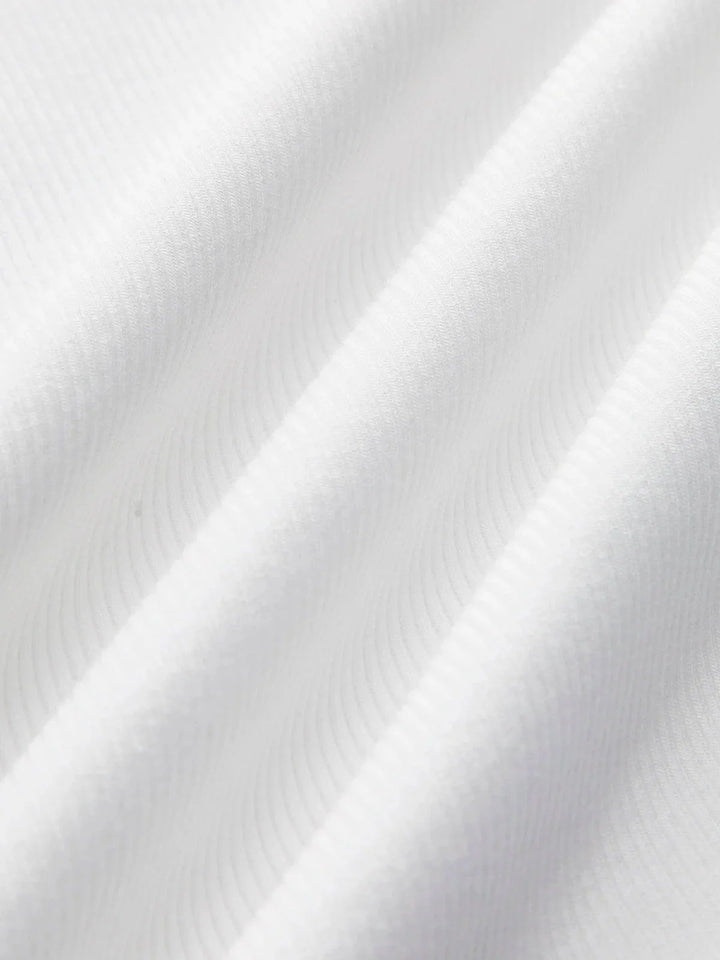 Black ribbed tank top crafted from soft cotton blend fabric with a sleek and modern design for effortless daily style.