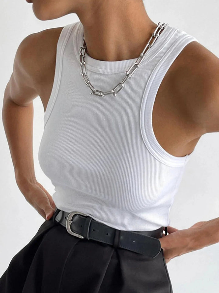 White ribbed tank top made for daily style, highlighting a sleek and modern design perfect for versatile outfits.