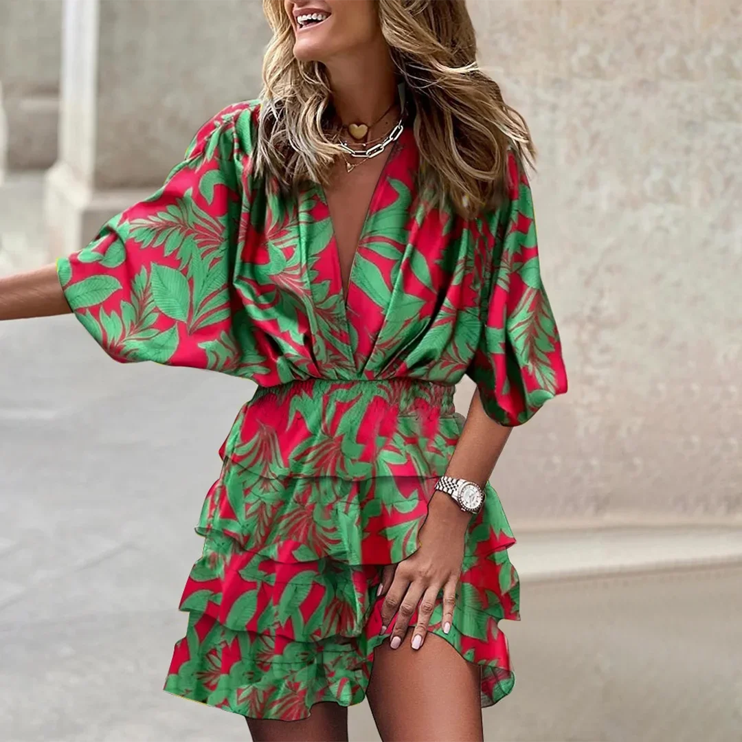 Green floral wrap mini dress with flared sleeves made from soft linen blend fabric, perfect for casual and stylish day looks.