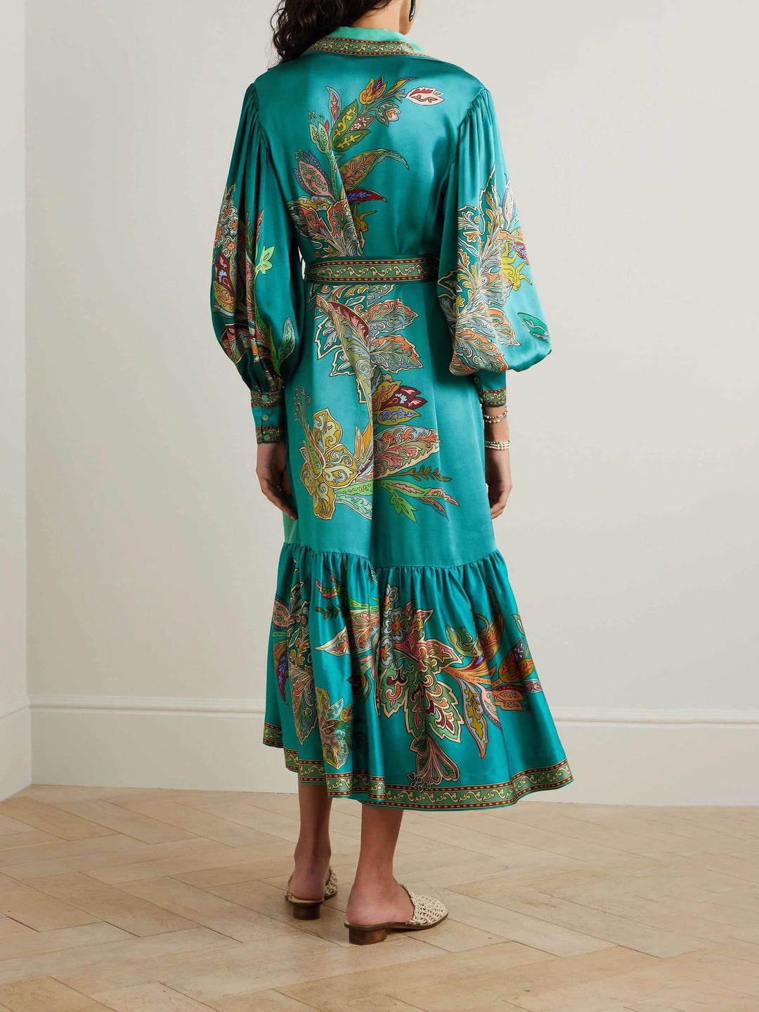 Flowy beige maxi dress with intricate detailing and a belted waist, perfect for summer outings and events.