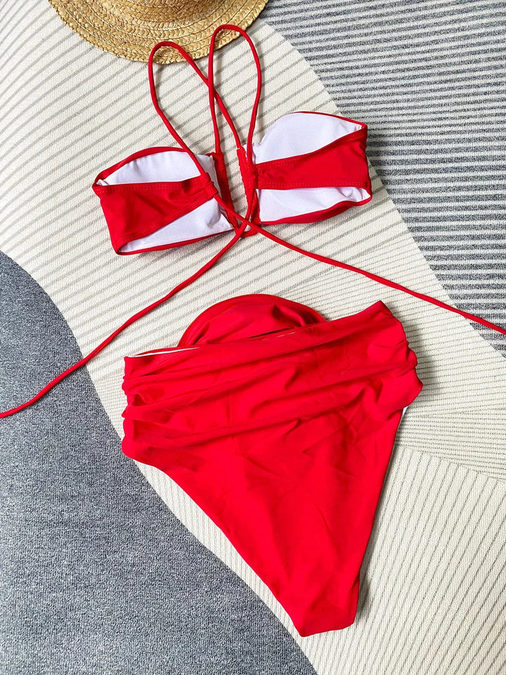 Women's bikini set featuring a delicate rose appliqué design, made of soft and stretchy fabric perfect for summer beach days.