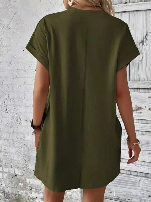 Navy blue mini dress with pockets made of soft cotton blend, perfect for everyday comfort and style by Taniyah.
