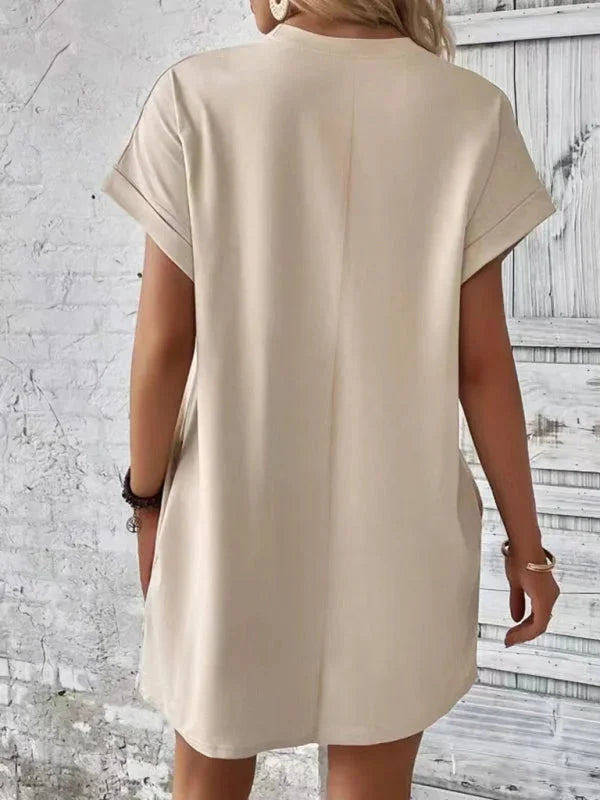 Taniyah mini dress crafted from soft cotton blend with convenient pockets, designed for everyday comfort and practicality.