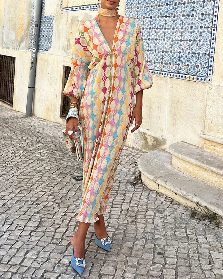 "Daisy wrap dress in Rainbow with pastel geometric pattern, a stylish and versatile addition to your wardrobe."