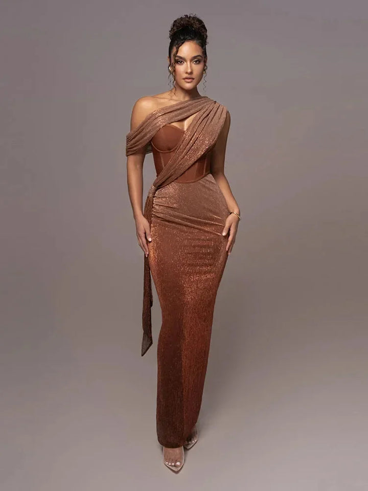 Brown asymmetric evening dress with shimmering textures. A Ariel standout with its unique design and elegant finish.