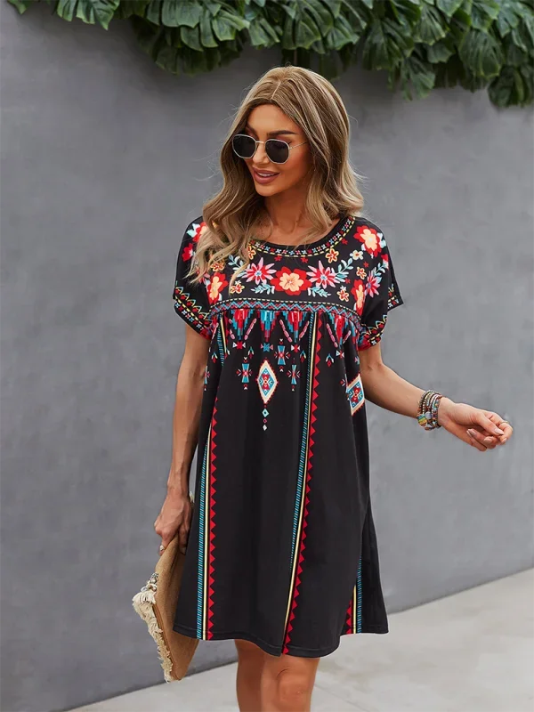 "Nihira mini dress featuring intricate floral embroidery on soft, flowing fabric in a boho style design."