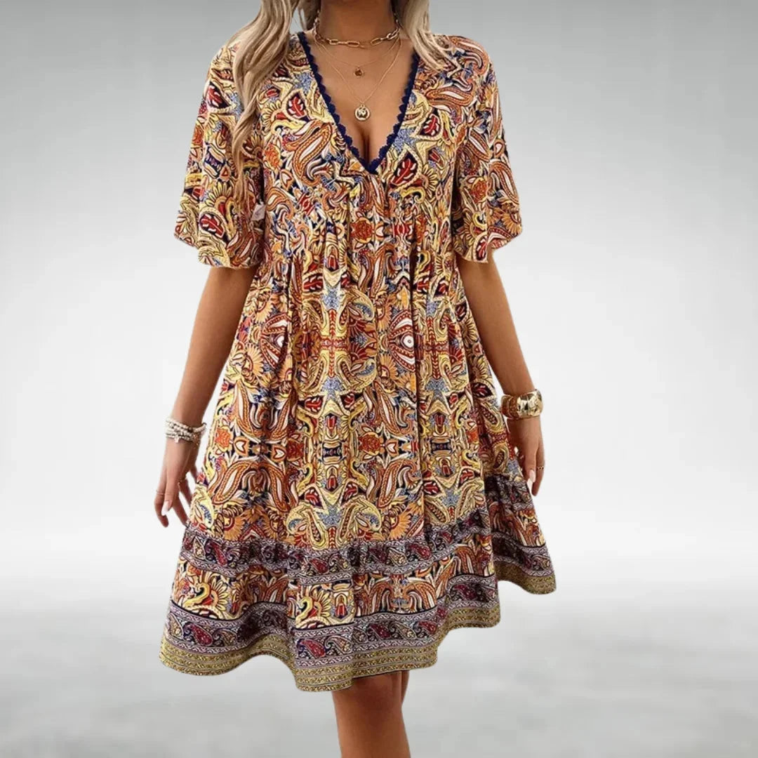 Yellow Erica mini dress with a relaxed fit and boho design, made from soft and breathable fabric.
