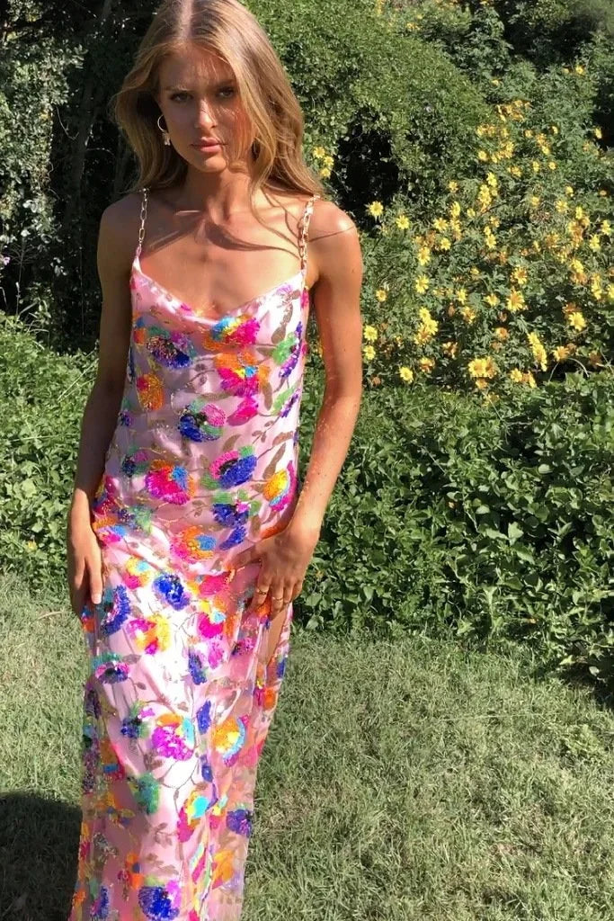 "Sabina floral dress with leg slit in soft cotton blend with vibrant floral pattern, perfect for a stylish and feminine…