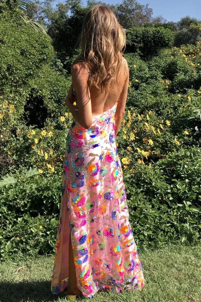 "Sabina floral dress in soft cotton blend with a thigh-high slit, perfect for a casual day out or special occasion."