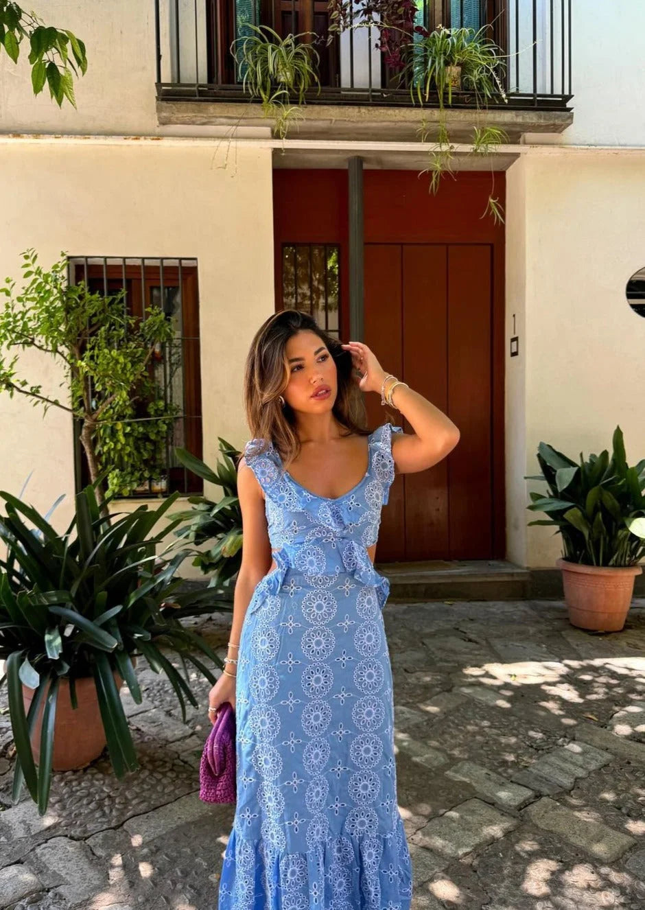 Blue patterned maxi dress with ruffles, has a Avanna flowing design perfect for any occasion.