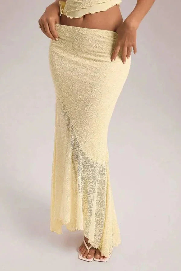 Cream lace crop top and skirt set for women, featuring delicate lace detailing and a flattering silhouette.