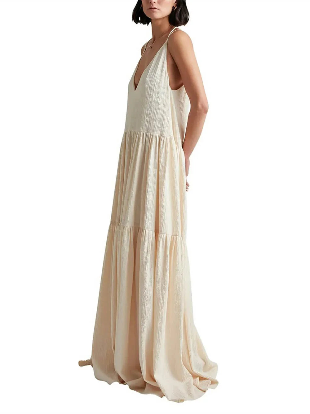 Cream maxi dress with flowing tiered skirt and V-neck design by Tinsley, made of soft and lightweight fabric for effortless…