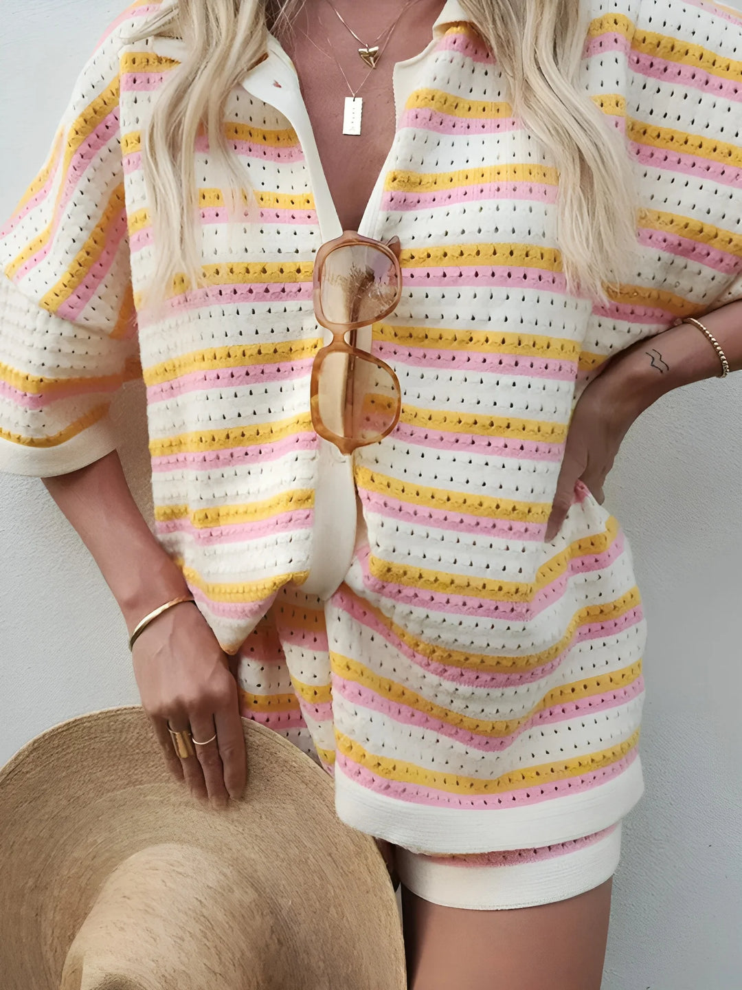 "Caleigh two-piece striped outfit made for summer leisure, featuring a relaxed fit top and drawstring shorts in a breezy,…