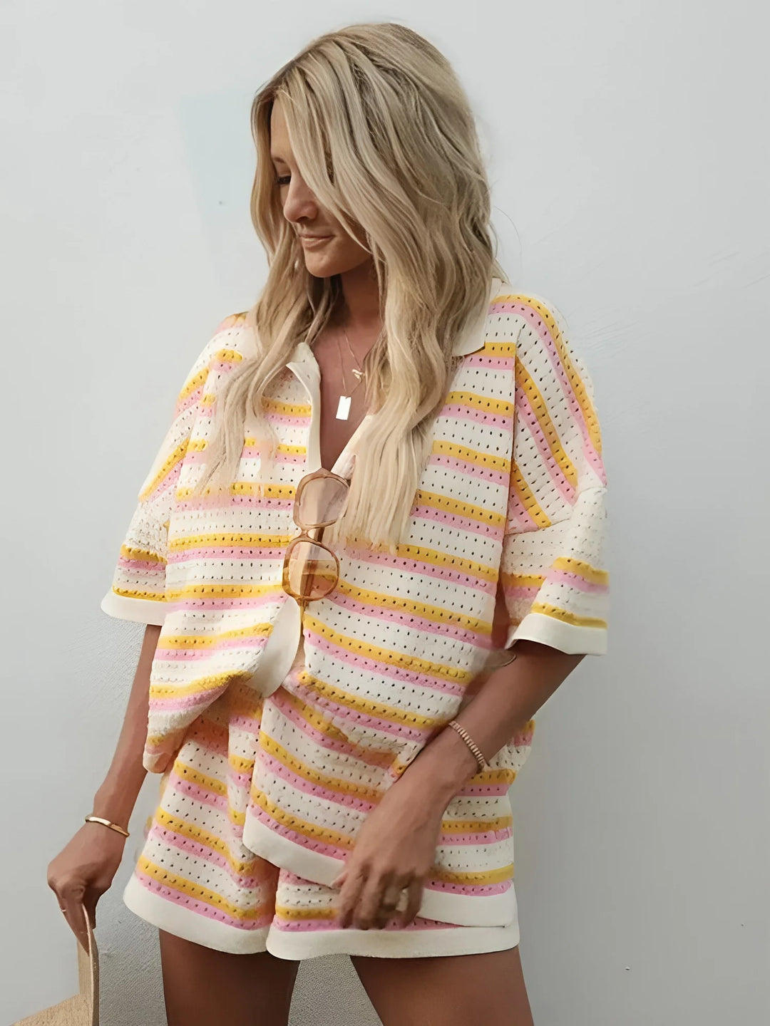 Caleigh - Two-piece striped outfit made for summer leisure, featuring breathable cotton fabric and trendy striped design.