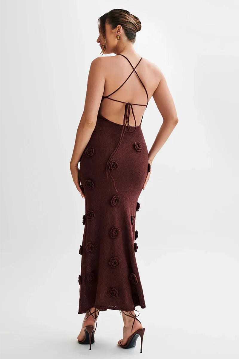 "Floral embellished maxi dress with mesh overlay, intricate embroidery, and plunging neckline by Beatrix."