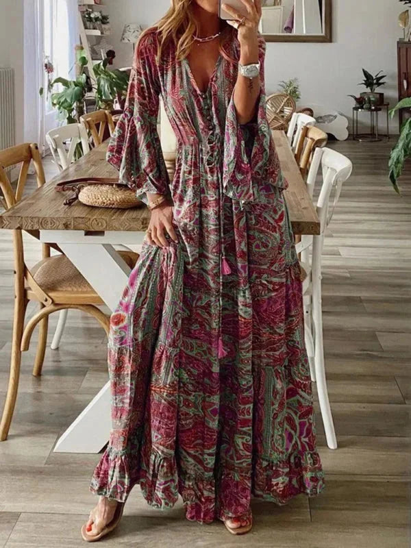 Red Channing bohemian dress with flared sleeves, featuring intricate floral embroidery on lightweight cotton fabric, perfect…