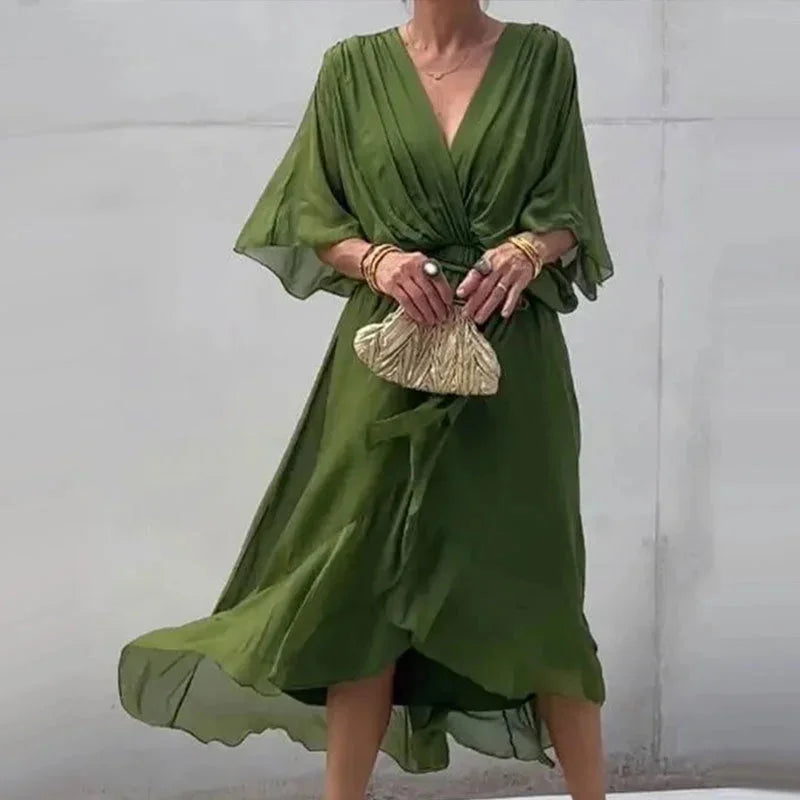 "Jhersi V-neck midi wrap dress in soft cotton blend with tie waist, perfect for everyday wear or casual occasions."