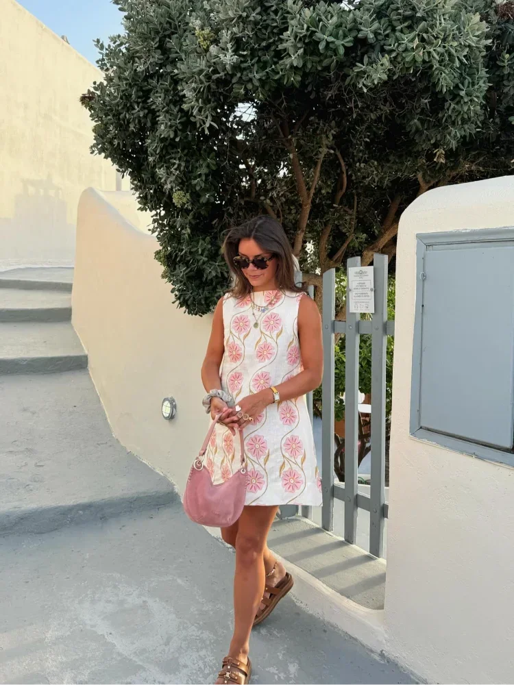 Pink floral A-Line sleeveless dress with a sweetheart neckline and breathable cotton fabric, perfect for summer outings.